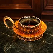 На память: Янтарный подсвечник с бронзой, диаметр 100 мм — фотография 1